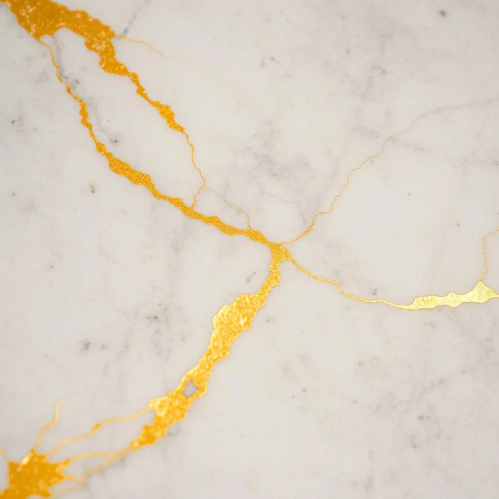 Marble material sample — Calacatta, Statuario, Nero